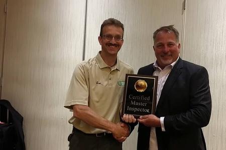 Scot Baker receiving his Certified Master Inspector recognition