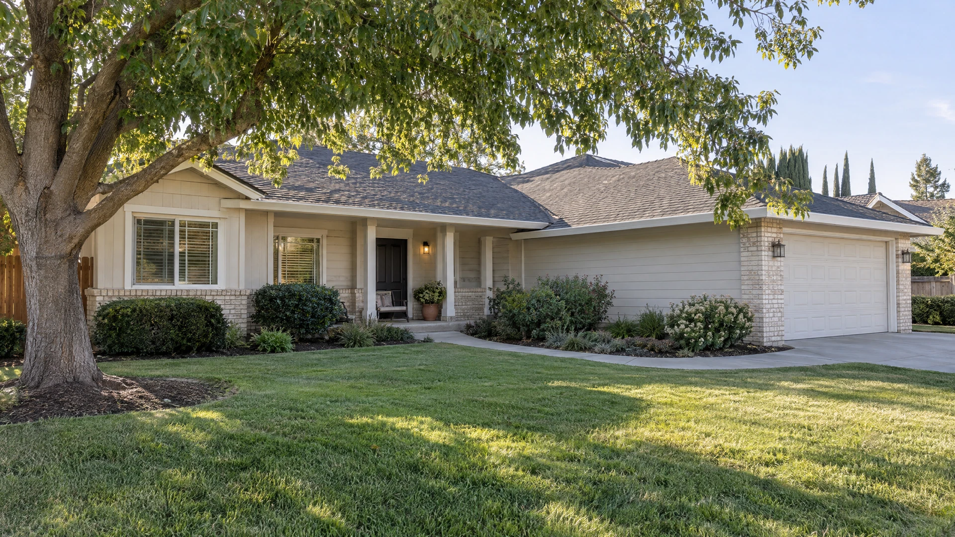 Illustrative Turlock-style single-story ranch home with a shaded front garden